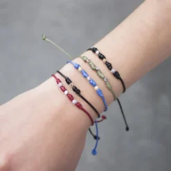 Pulsera Mik Negra Eguzkilore Oro Blanco